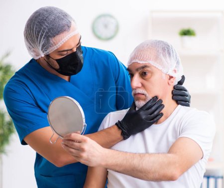 Photo for Old man visiting doctor for plastic surgery - Royalty Free Image