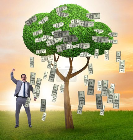 Téléchargez les photos : L'homme d'affaires avec l'arbre de l'argent dans le concept d'entreprise - en image libre de droit