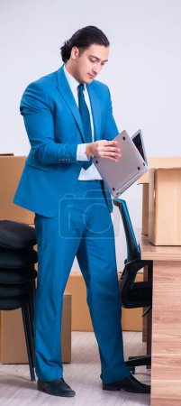 Photo for The young handsome businessman being fired from his work - Royalty Free Image
