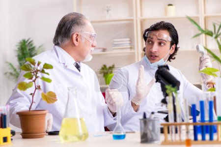 Photo for The two chemists working in the lab - Royalty Free Image
