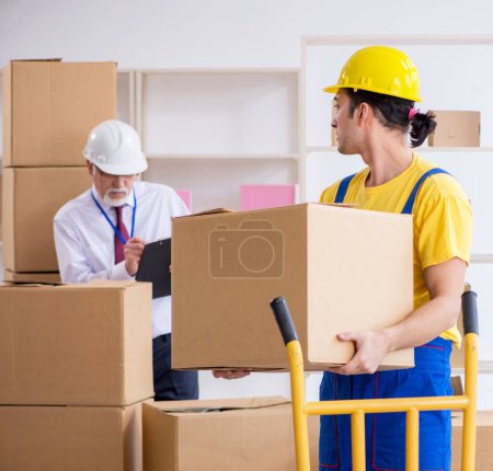 Photo for The professional movers doing home relocation - Royalty Free Image