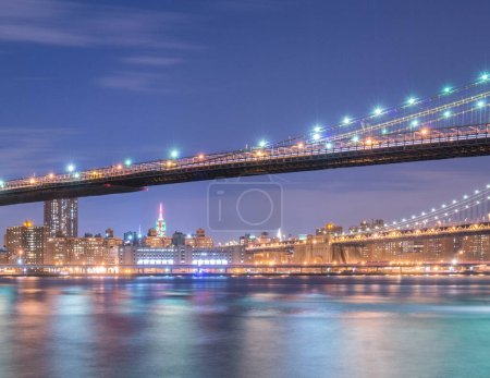 Photo for The night view of manhattan and brooklyn bridge - Royalty Free Image