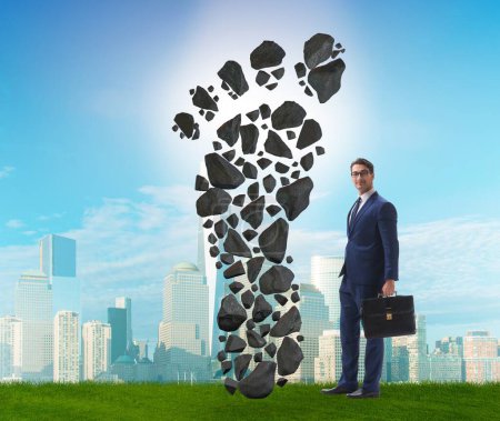 Photo for The carbon footprint concept with businessman - Royalty Free Image