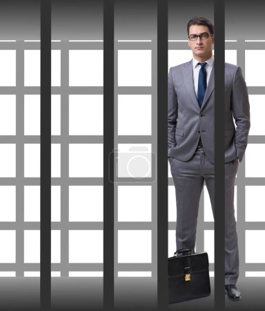Foto de El hombre de negocios en la jaula aislado en blanco - Imagen libre de derechos