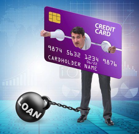 Téléchargez les photos : L'homme d'affaires dans le concept de fardeau de la carte de crédit au pilori - en image libre de droit