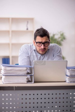 Photo for Young businessman employee working in the office - Royalty Free Image
