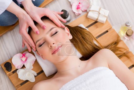 Photo for The young woman during spa procedure in salon - Royalty Free Image