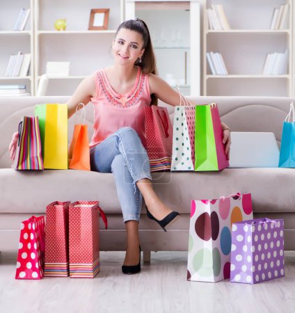 Photo for The young woman after shopping with bags - Royalty Free Image