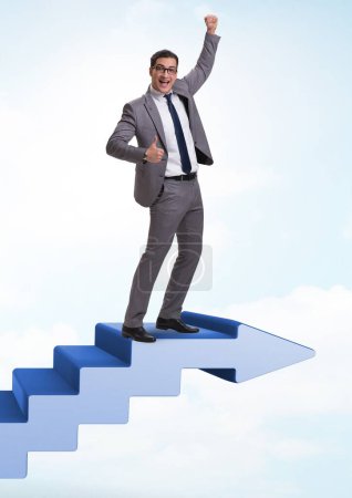 Photo for The businessman climbing career ladder in business concept - Royalty Free Image