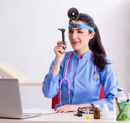 Photo for The young female doctor working in the clinic - Royalty Free Image