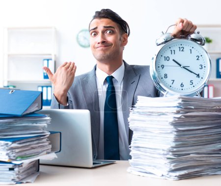 Photo for The businessman with heavy paperwork workload - Royalty Free Image
