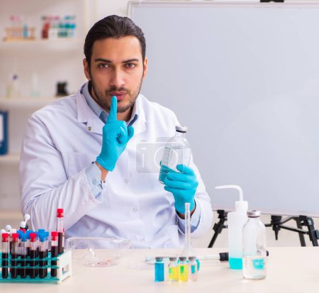 Photo for Young male doctor working in the lab - Royalty Free Image