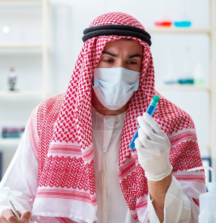 Photo for The arab chemist working in the lab office - Royalty Free Image