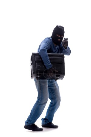 Photo for Young burglar holding bag isolated on white - Royalty Free Image