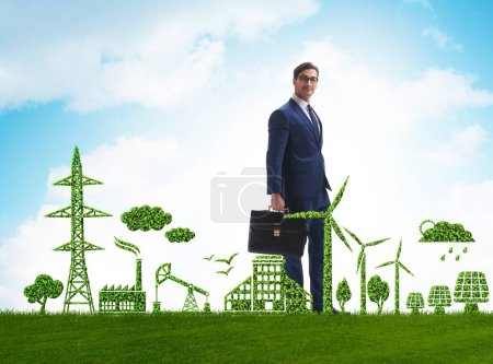 Téléchargez les photos : Homme d'affaires en vert et concept environnemental - en image libre de droit