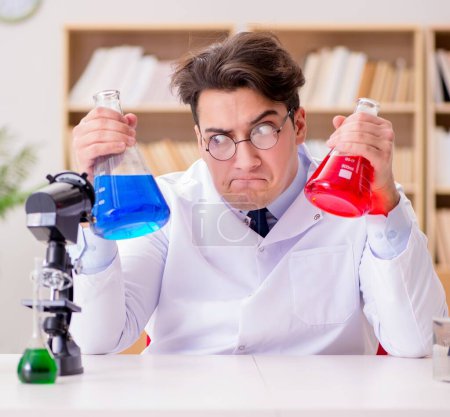 Photo for The mad crazy scientist doctor doing experiments in a laboratory - Royalty Free Image