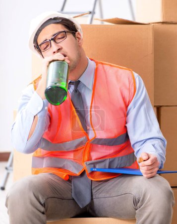 Photo for The delivery man drunk at work - Royalty Free Image