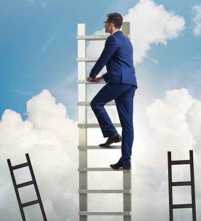 Foto de El concepto de carrera con el hombre de negocios escalando escalera - Imagen libre de derechos
