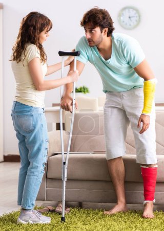 Photo for The young family helping each other after injury - Royalty Free Image