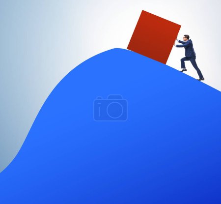Photo for Businessman pushing the cube towards the top - Royalty Free Image