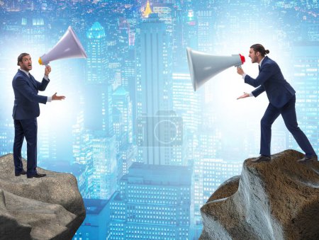 Photo for The businessman shouting with loudspeaker at each other - Royalty Free Image
