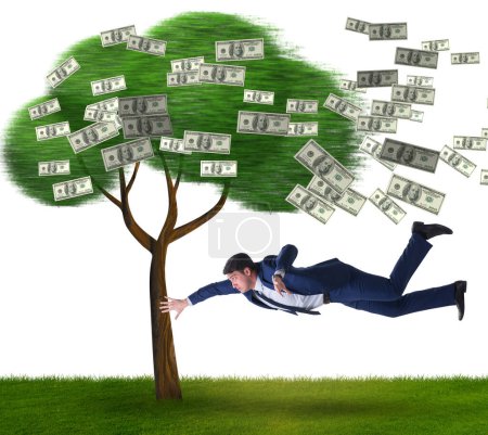 Foto de El hombre de negocios voló lejos del árbol del dinero - Imagen libre de derechos