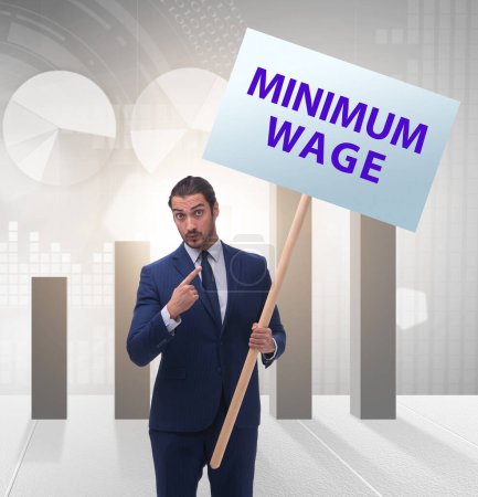 Le concept de salaire minimum avec l'homme d'affaires
