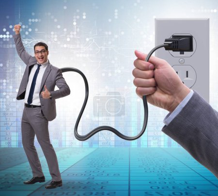 The businessman being powered by electricity and plug