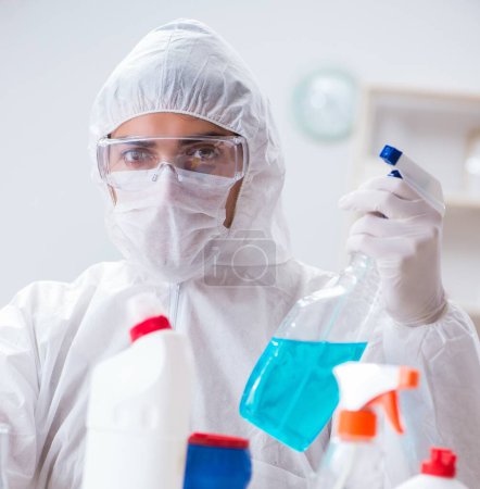 Photo for The chemist checking the quality of bathroom supplies - Royalty Free Image