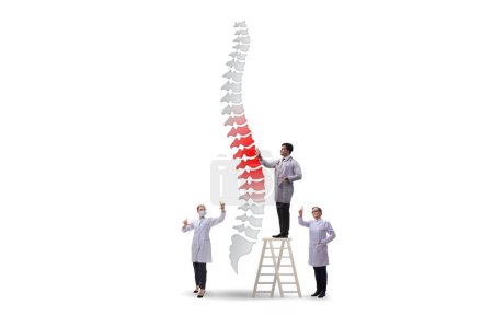 Foto de Concepto médico con los médicos y la columna vertebral - Imagen libre de derechos