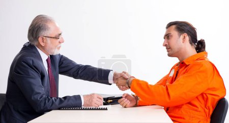 Photo for Young captive meeting with advocate in pretrial detention - Royalty Free Image
