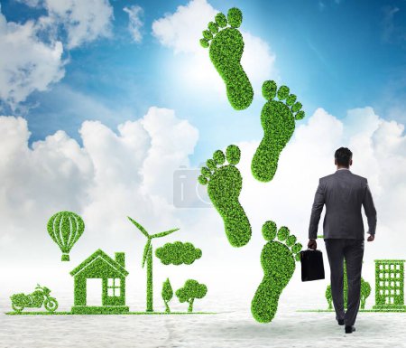 The carbon footprint concept with businessman
