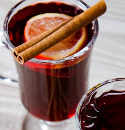Photo for The mulled wine glintwine served in glasses for christmas table - Royalty Free Image