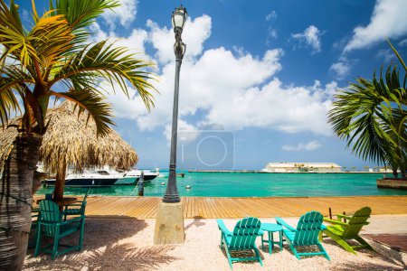 Photo for Idyllic tropical waterfront in Oranjestad in Caribbean Aruba island with view of turquoise ocean water - Royalty Free Image