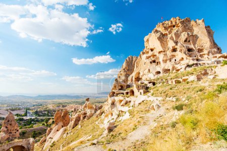 Foto de View of Uchisar castle rock formations and fairy chimneys in Cappadocia Turkey - Imagen libre de derechos