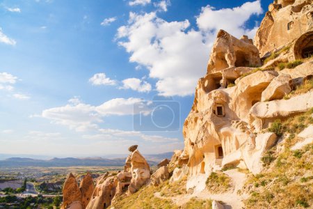 Foto de View of Uchisar castle rock formations and fairy chimneys in Cappadocia Turkey - Imagen libre de derechos