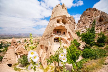 View of rock formations and fairy chimneys near Uchisar castle in Cappadocia Turkey