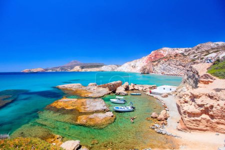 Photo for Idyllic Fyriplaka beach surrounded by beautiful cliffs on Greek island of Milos - Royalty Free Image