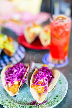 Foto de Close up of traditional mexican tacos served for lunch in restaurant - Imagen libre de derechos