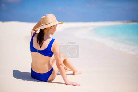 Photo for Adorable teenage girl at beach during summer vacation on Maldives - Royalty Free Image