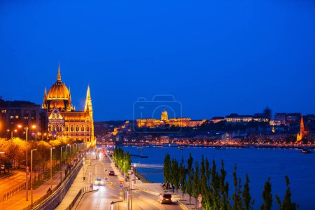 Photo for Evening view of Parliament and Buda castle in beautiful town of Budapest - Royalty Free Image