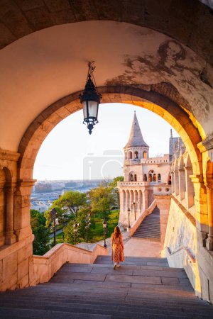 Photo for Back view of beautiful woman at Fisherman's Bastion in Budapest Hungary - Royalty Free Image