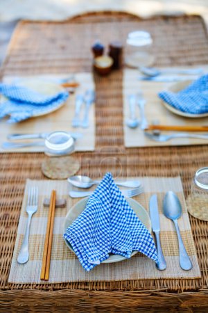 Photo for Beautifully served table for luxury beach picnic - Royalty Free Image