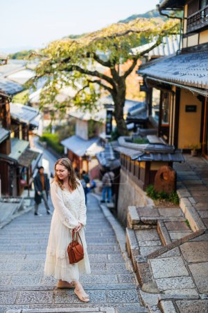 Photo for Beautiful woman in Gion Kyoto at early morning - Royalty Free Image