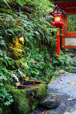 Photo for Purification water in Kifune Shrine near Kyoto Japan that is dedicated to the god of water - Royalty Free Image