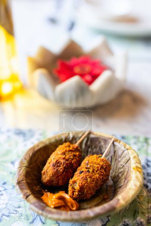 Photo for Indian cottage cheese paneer fingers coated with local savoury spices - Royalty Free Image