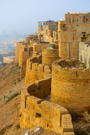 Photo for Massive yellow sandstone walls of Jaisalmer fort in Rajasthan India - Royalty Free Image