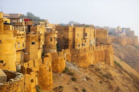 Photo for Massive yellow sandstone walls of Jaisalmer fort in Rajasthan India - Royalty Free Image