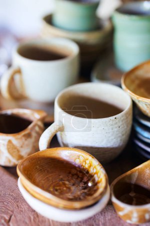 Photo for Handmade small ceramic dishes and cups for sale - Royalty Free Image
