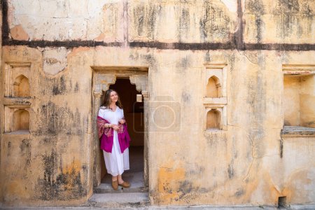 Photo for Beautiful woman in Amer fort in Jaipur India - Royalty Free Image